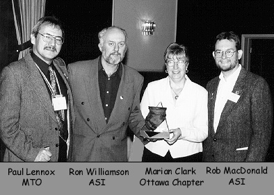 Ron Williamson and Rob MacDonald receiving PAPA from Paul Lennox and Marian Clark